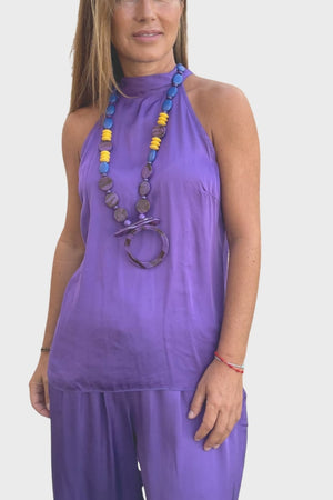 La imagen muestra un blusa de mujer y el enlace da acceso a la colección de Blusas y tops.