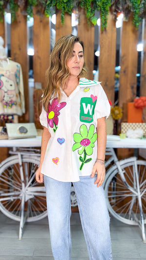 Camisa con aplicaciones