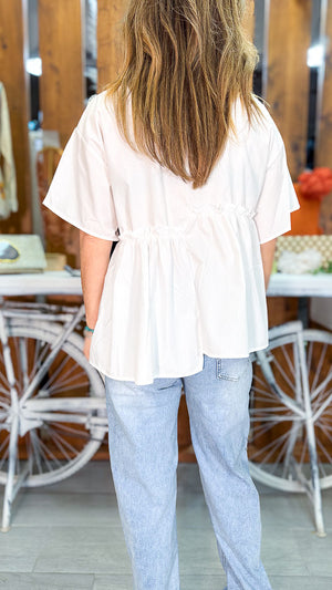 Camisa asimetrica lazo