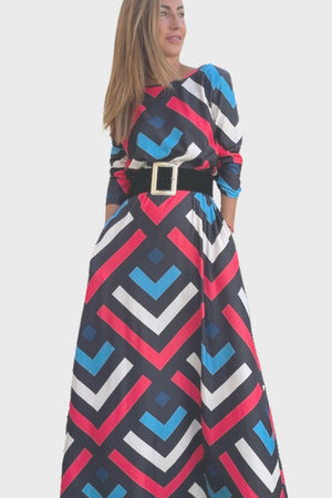 La imagen muestra un vestido largo de mujer y enlaza a la colección de vestidos y monos de la tienda online